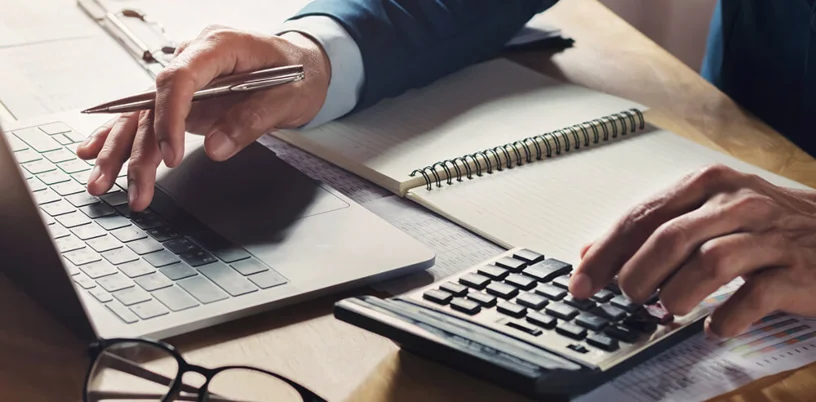 Business man working calculating figures