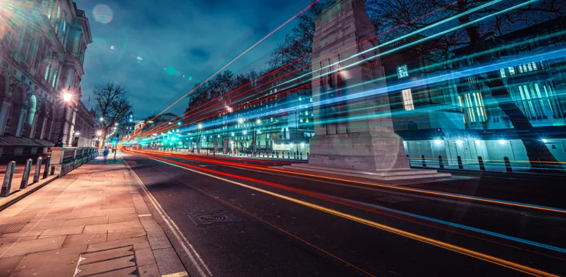 Bus moving at speed on road