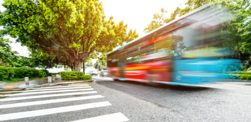 Bus moving on road