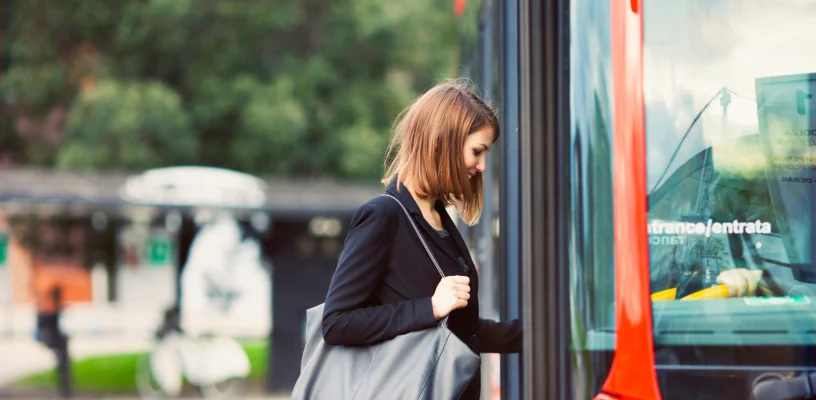 Women getting on bus