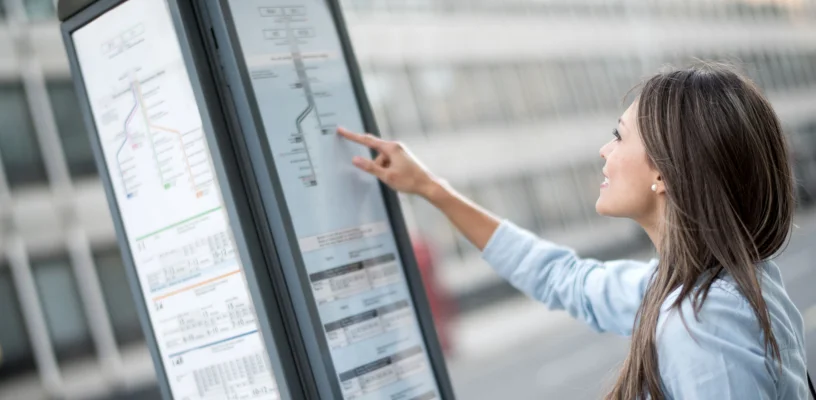 Women looking at timetable